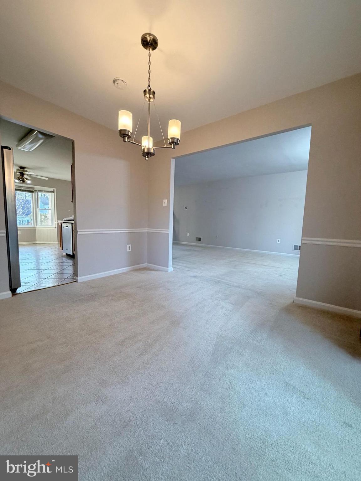 7910 Richfield Road Springfield, VA 22153 - Photo 4 of 14 a view of a livingroom with a chandelier