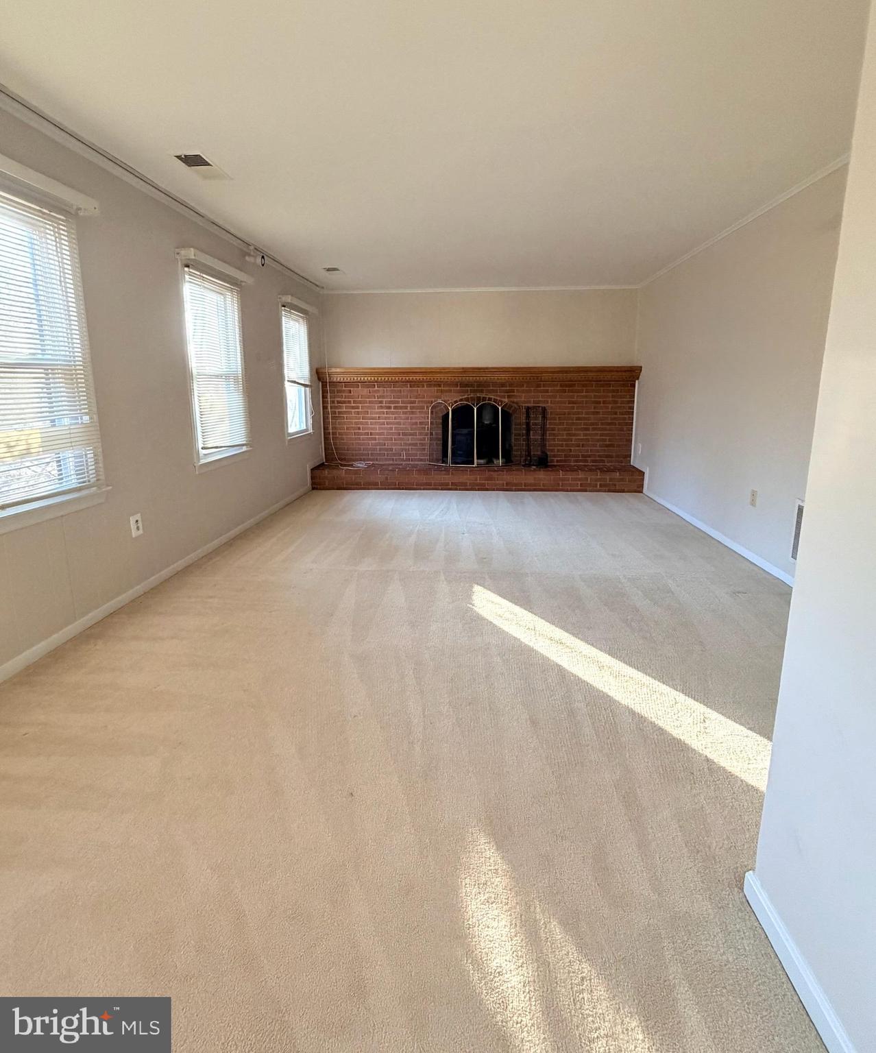 7910 Richfield Road Springfield, VA 22153 - Photo 9 of 14 a view of a room with a fireplace