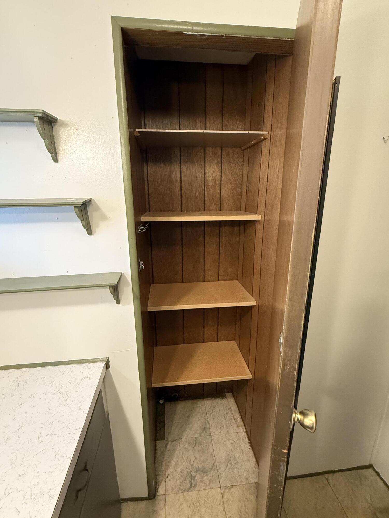 421 Stevens Road, Unit 20 Eagle Point, OR 97524 - Photo 17 of 22 a view of walk in closet with empty racks