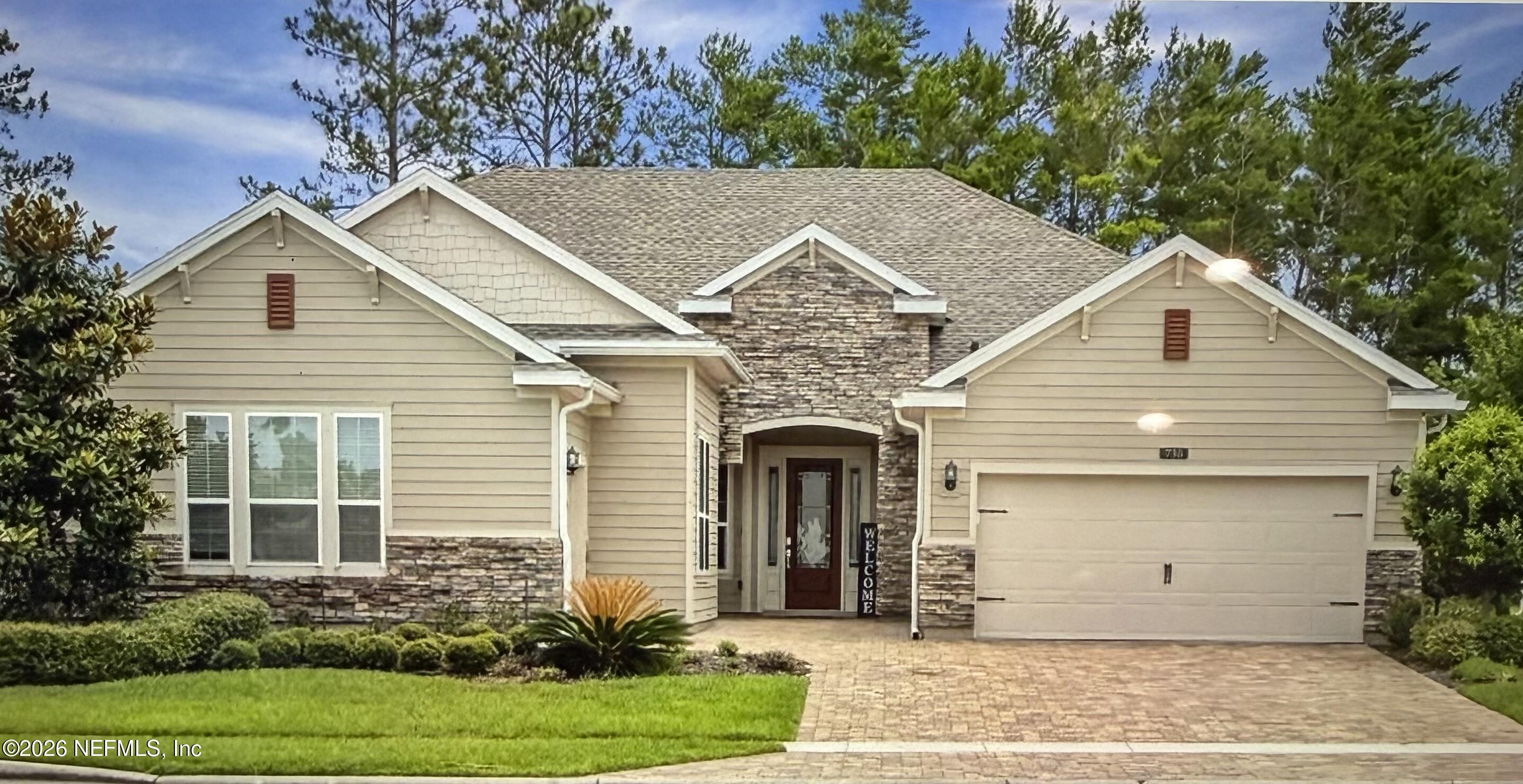 730 Enrede Lane St. Augustine, FL 32095 - Photo 1 of 1 a front view of a house with a garden
