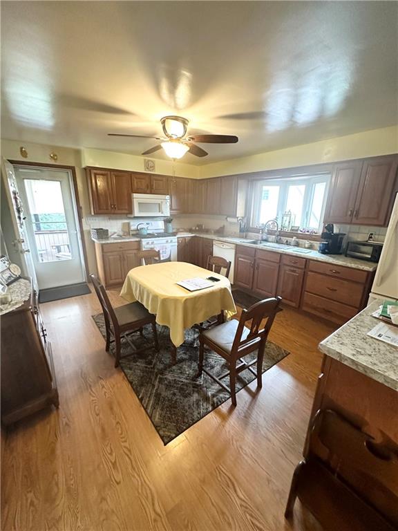 128 Johnetta Road Vandergrift, PA 15690 - Photo 14 of 32 a dining room with furniture and a chandelier