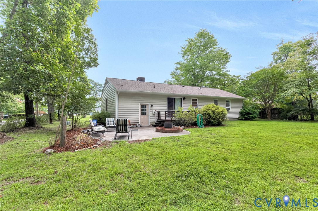 635 River Oaks Road Center Cross, VA 22437 - Photo 39 of 63 Expansive backyard featuring a large green lawn an