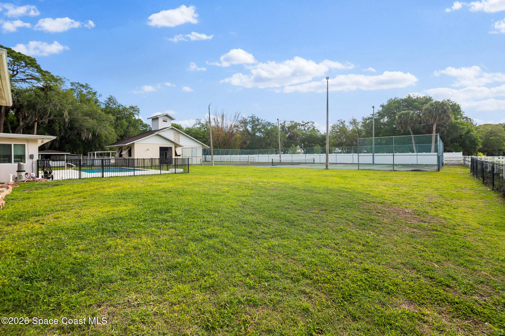 2885 Turtle Mound Road Melbourne, FL 32934 - Photo 53 of 77 Tennis Court