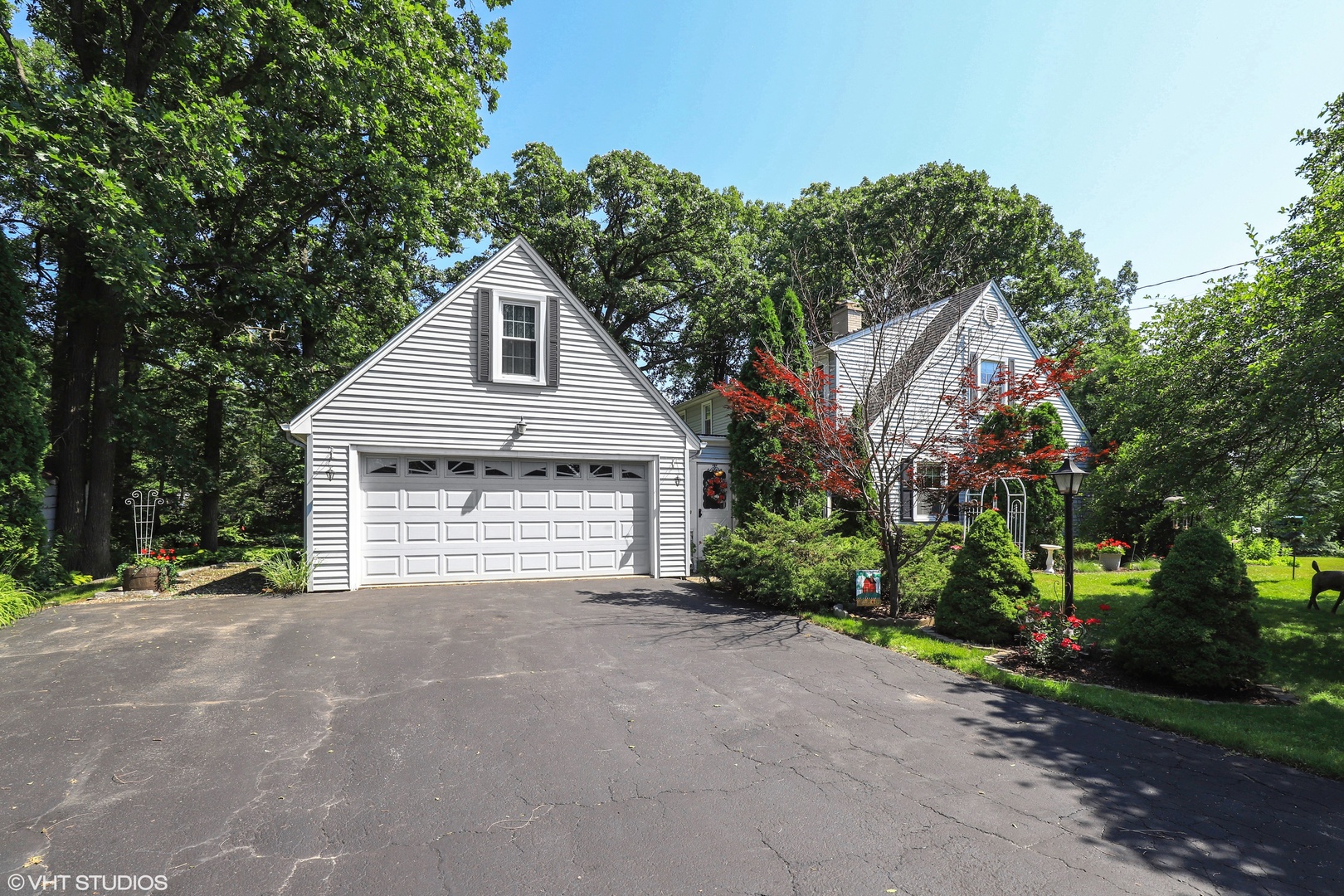 130 South Delany Road Gurnee, IL 60031 - Photo 22 of 24 a front view of a house with a garden
