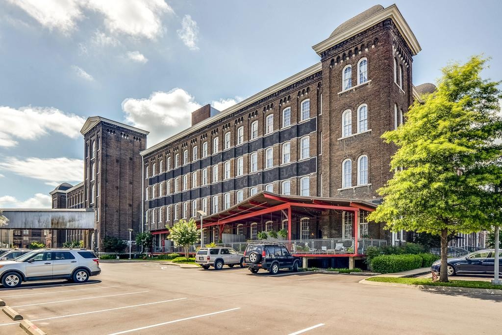 1350 Rosa L Parks Boulevard, Unit 239 Nashville, TN 37208 - Photo 17 of 23 a car parked in front of a building
