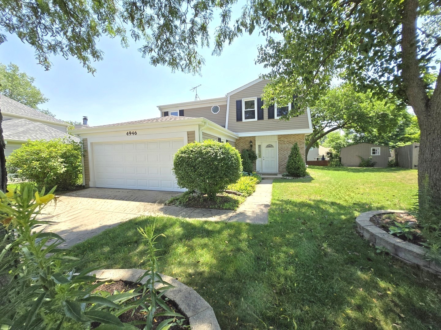 4946 Somerton Drive Hoffman Estates, IL 60010 - Photo 1 of 32 a view of a house with a backyard