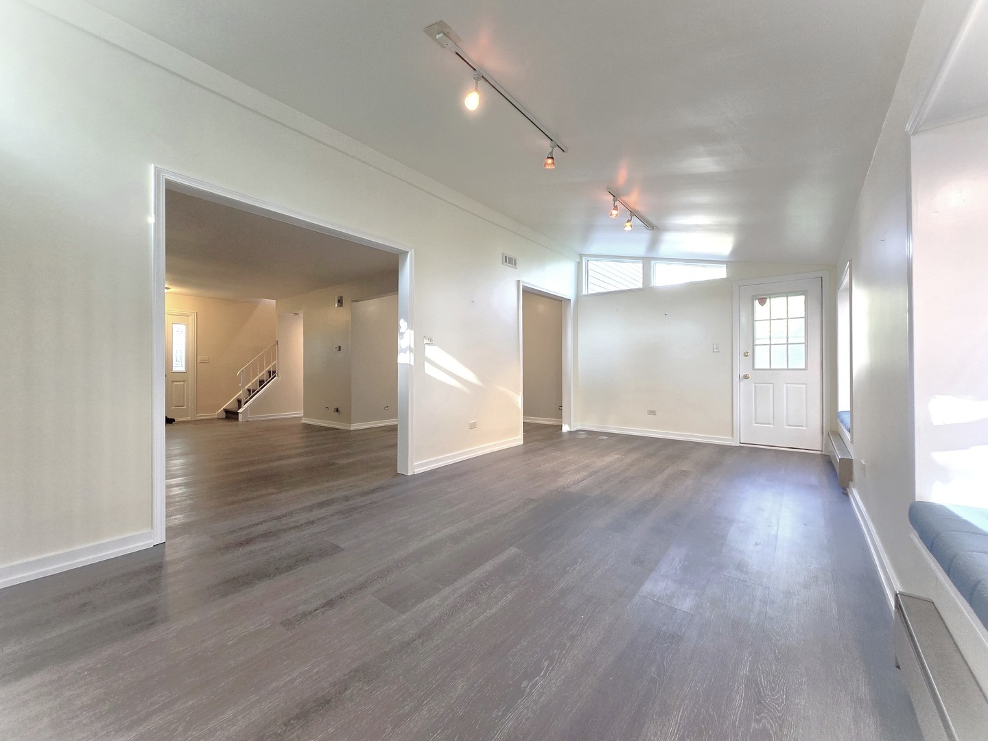 4946 Somerton Drive Hoffman Estates, IL 60010 - Photo 13 of 32 a view of a room with wooden floor and window