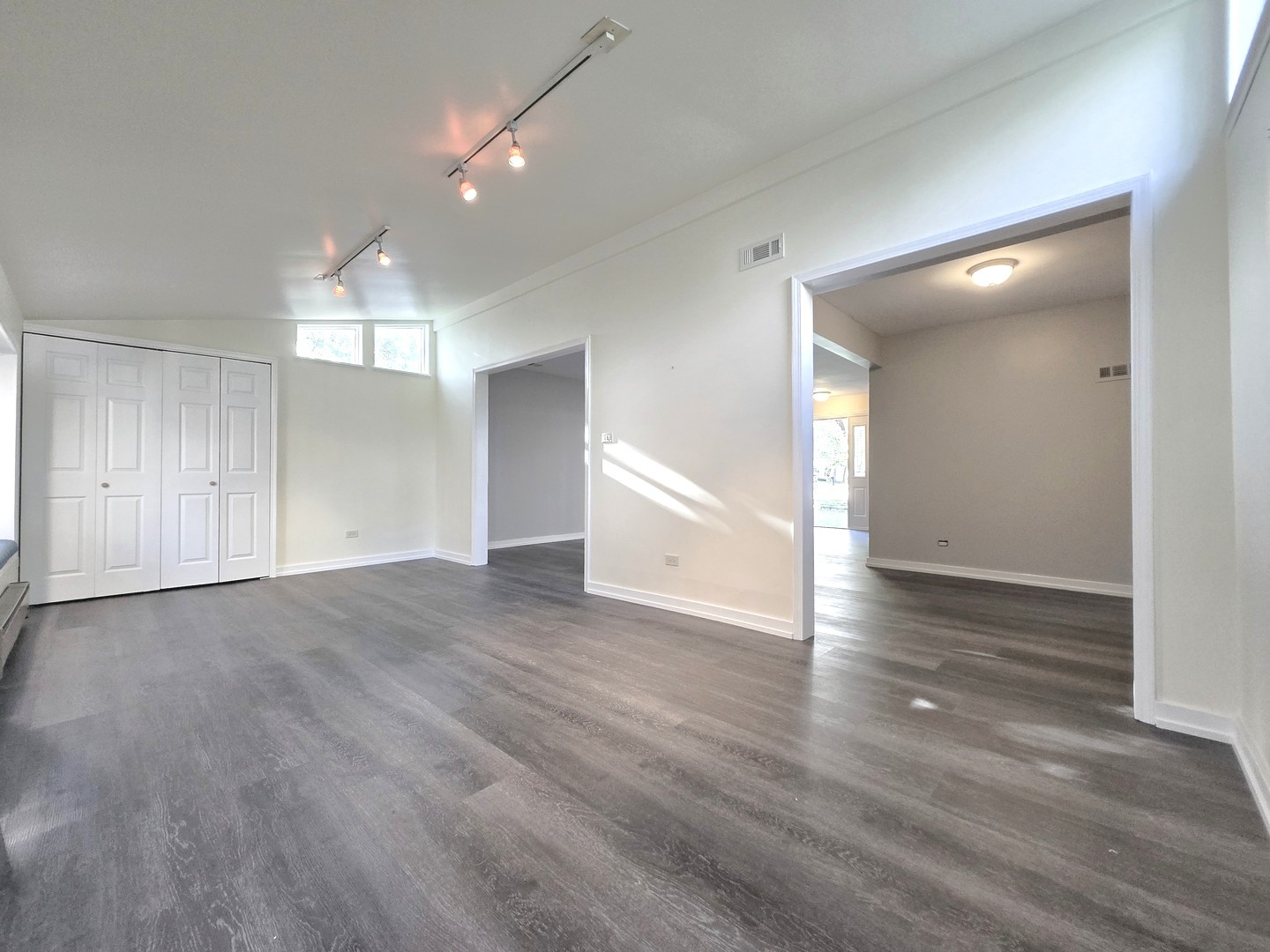 4946 Somerton Drive Hoffman Estates, IL 60010 - Photo 14 of 32 a view of empty room with wooden floor