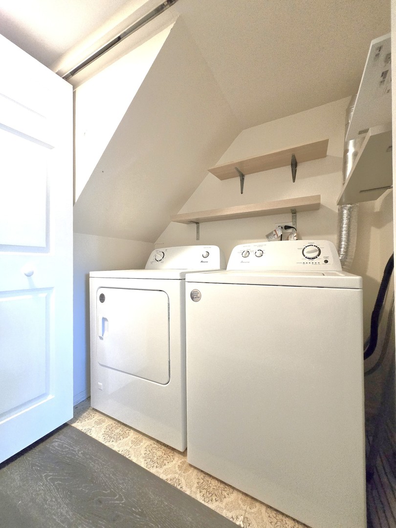 4946 Somerton Drive Hoffman Estates, IL 60010 - Photo 17 of 32 a utility room with dryer and washer