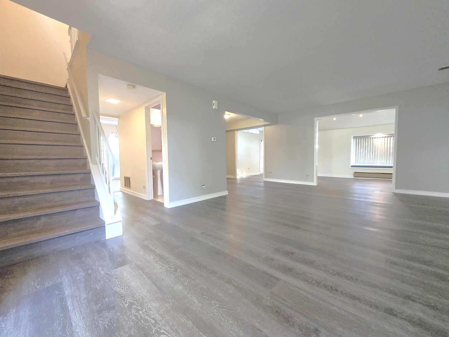 4946 Somerton Drive Hoffman Estates, IL 60010 - Photo 3 of 32 a view of an empty room with wooden floor