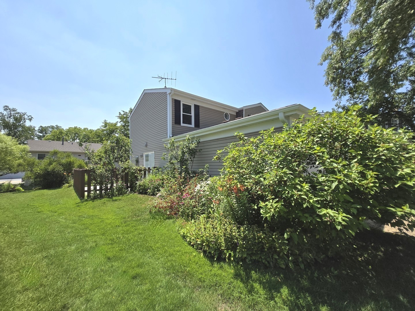 4946 Somerton Drive Hoffman Estates, IL 60010 - Photo 31 of 32 a view of a house with a yard and sitting area