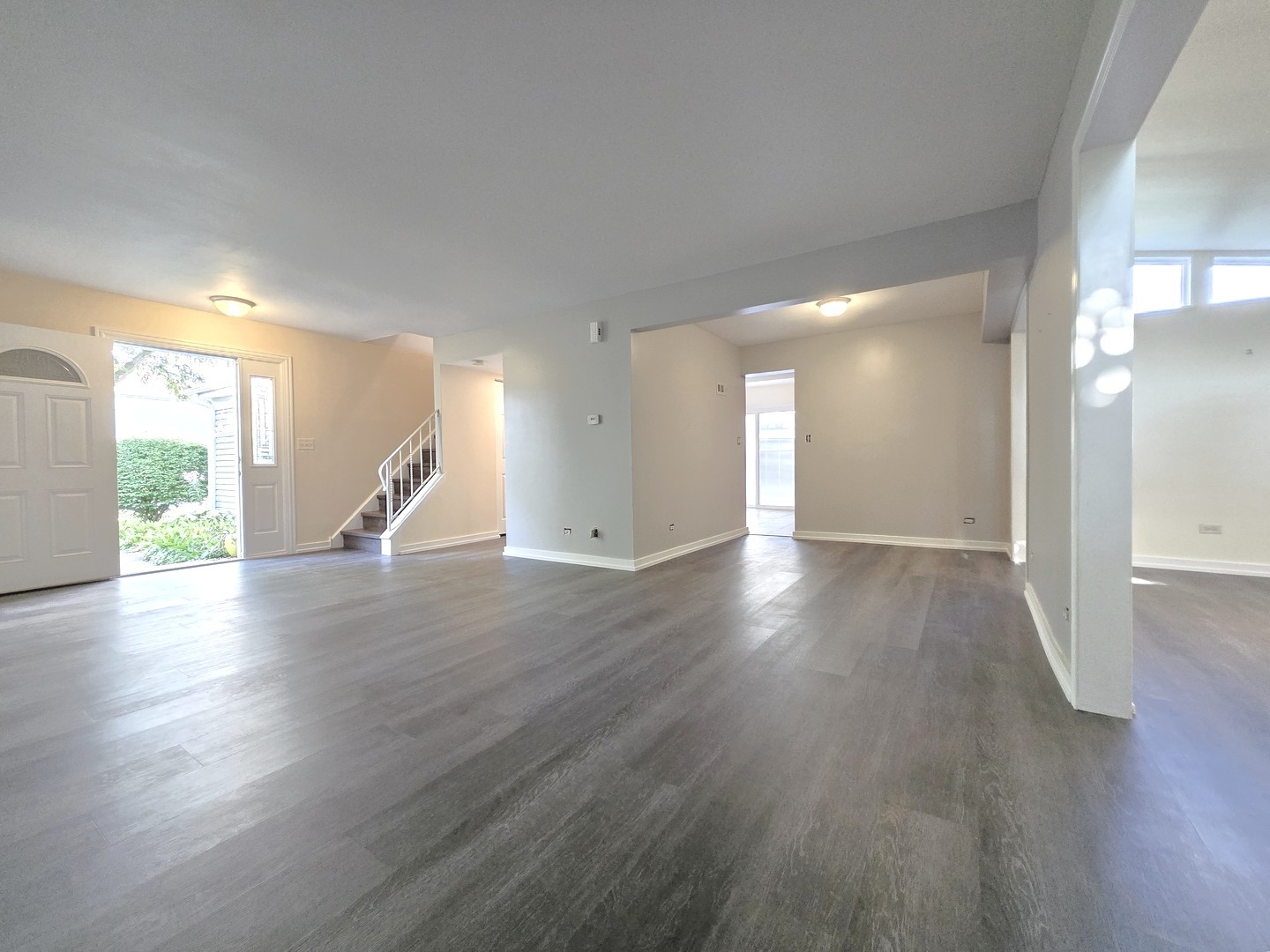 4946 Somerton Drive Hoffman Estates, IL 60010 - Photo 4 of 32 a view of empty room with wooden floor