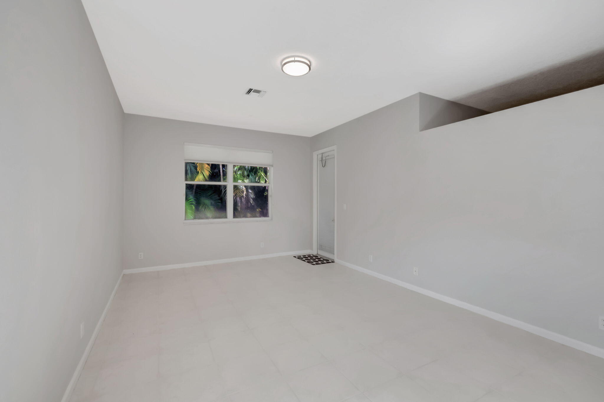5916 Seashell Terrace Boynton Beach, FL 33437 - Photo 16 of 81 a view of an empty room with a window