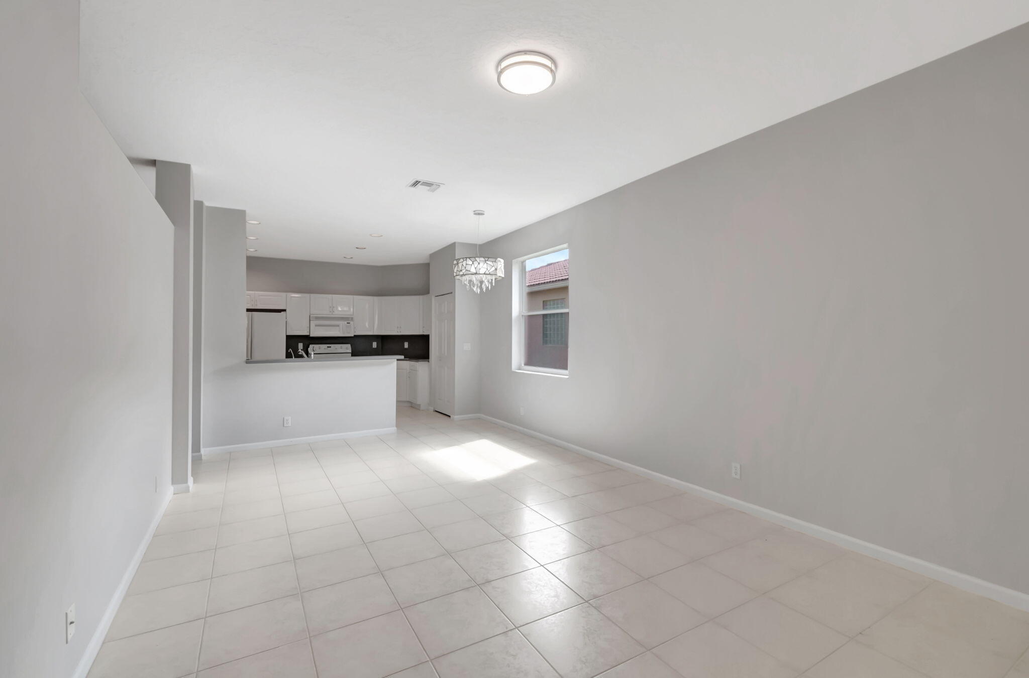 5916 Seashell Terrace Boynton Beach, FL 33437 - Photo 18 of 81 a view of a electric appliances and cabinets in a room
