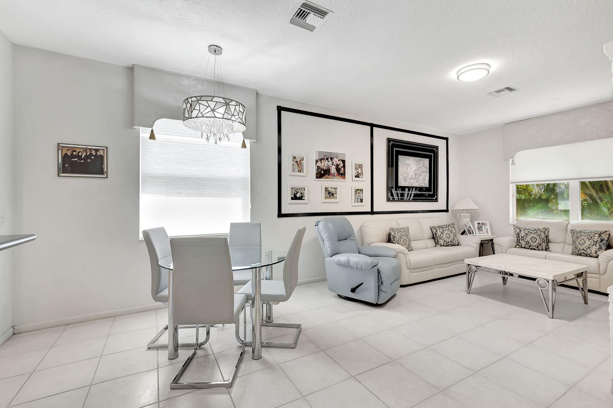 5916 Seashell Terrace Boynton Beach, FL 33437 - Photo 20 of 81 a living room with furniture and a window