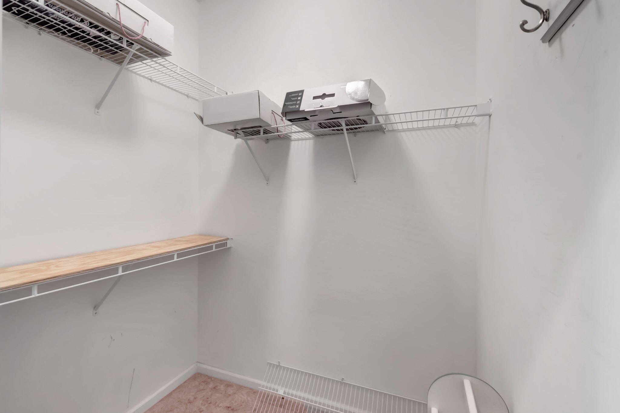 5916 Seashell Terrace Boynton Beach, FL 33437 - Photo 36 of 81 a view of a room with racks on the wall