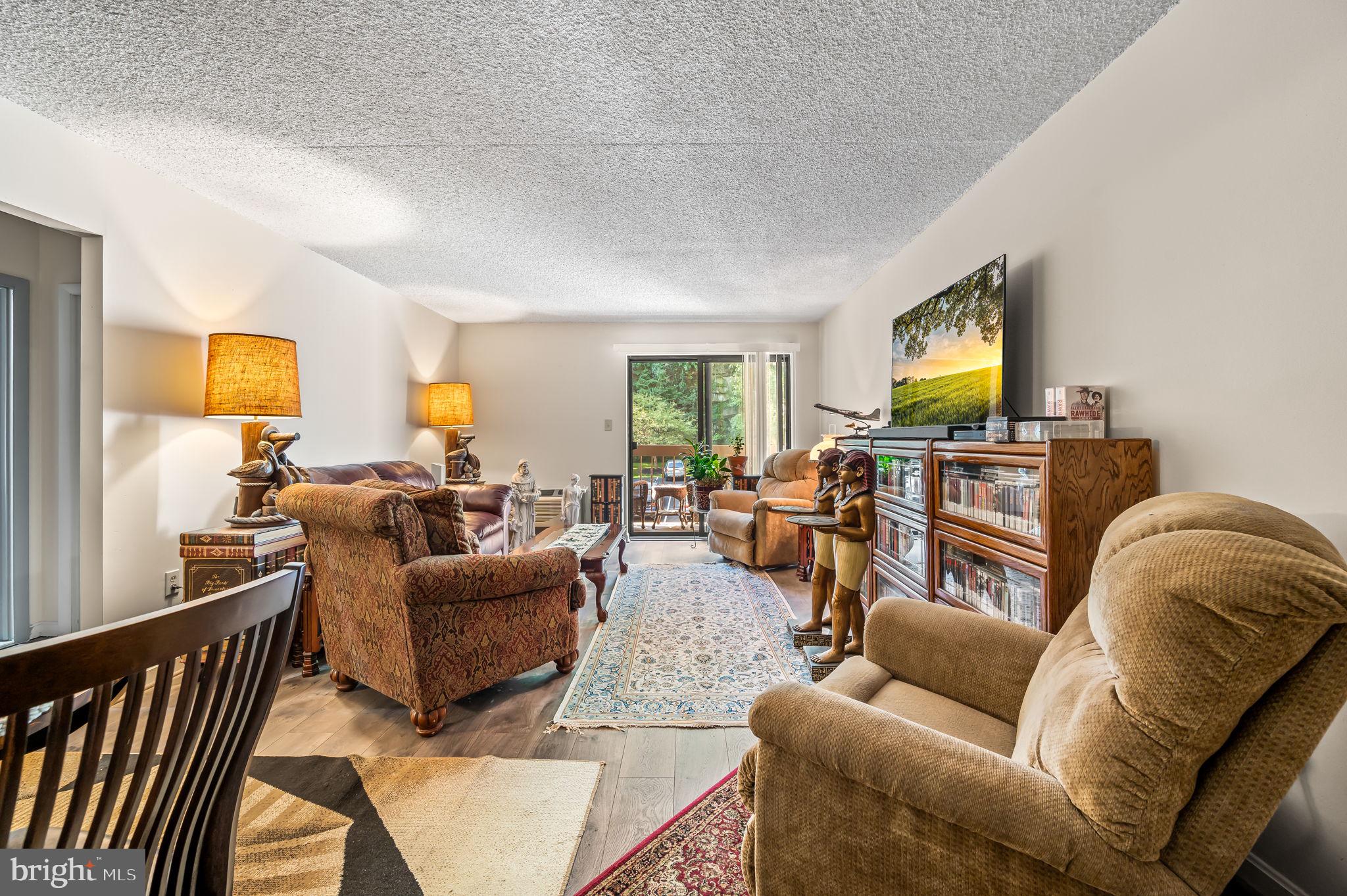 800 Avondale Road, Unit 2P Wallingford, PA 19086 - Photo 2 of 19 Living room w balcony.