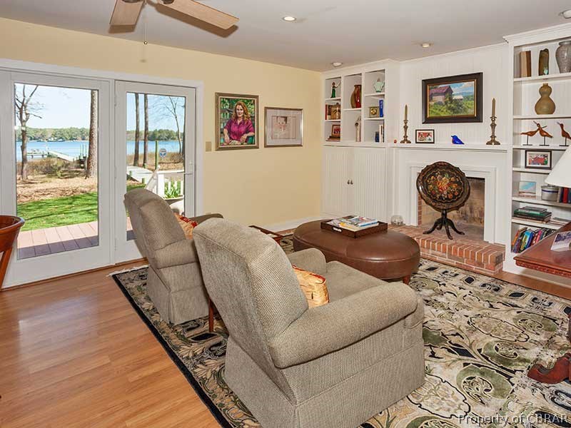 143 Long Point Lane Cardinal, VA 23025 - Photo 11 of 36 COZY SITTING AREA TO ENJOY THE EVENINGS OR WINTER DAYS