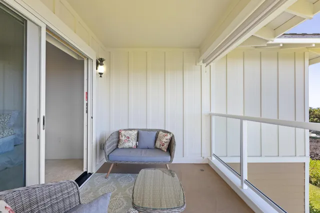 a bathroom with a granite countertop sink mirror and bathtub