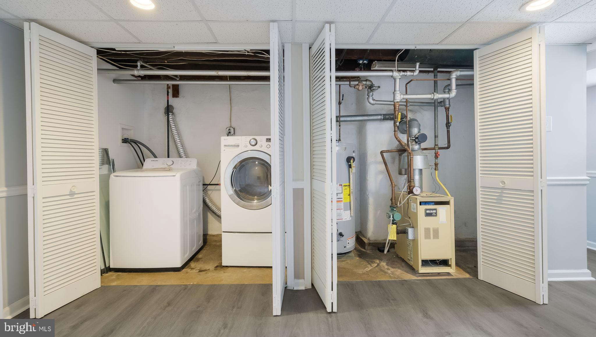 2035 Ripley Street Philadelphia, PA 19152 - Photo 23 of 30 a view of a storage & utility room with washer and dryer