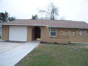 8917 Cairo Lane Port Richey, FL 34668 - Photo 1 of 1 a front view of a house