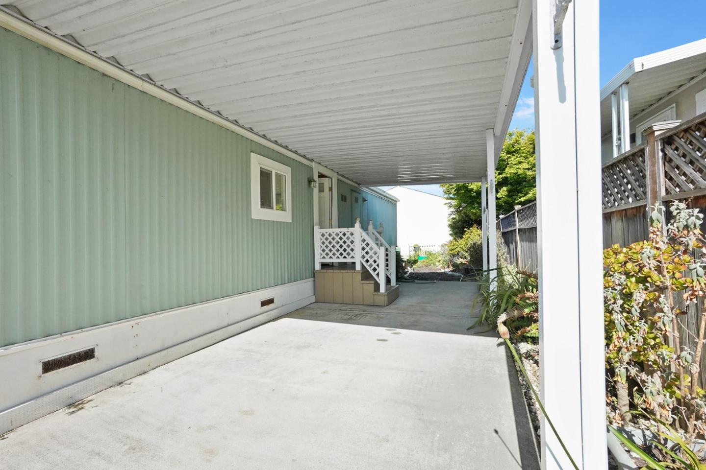 7 Sea Shell Circle, Unit 7 Half Moon Bay, CA 94019 - Photo 24 of 36 a front view of a house with garden