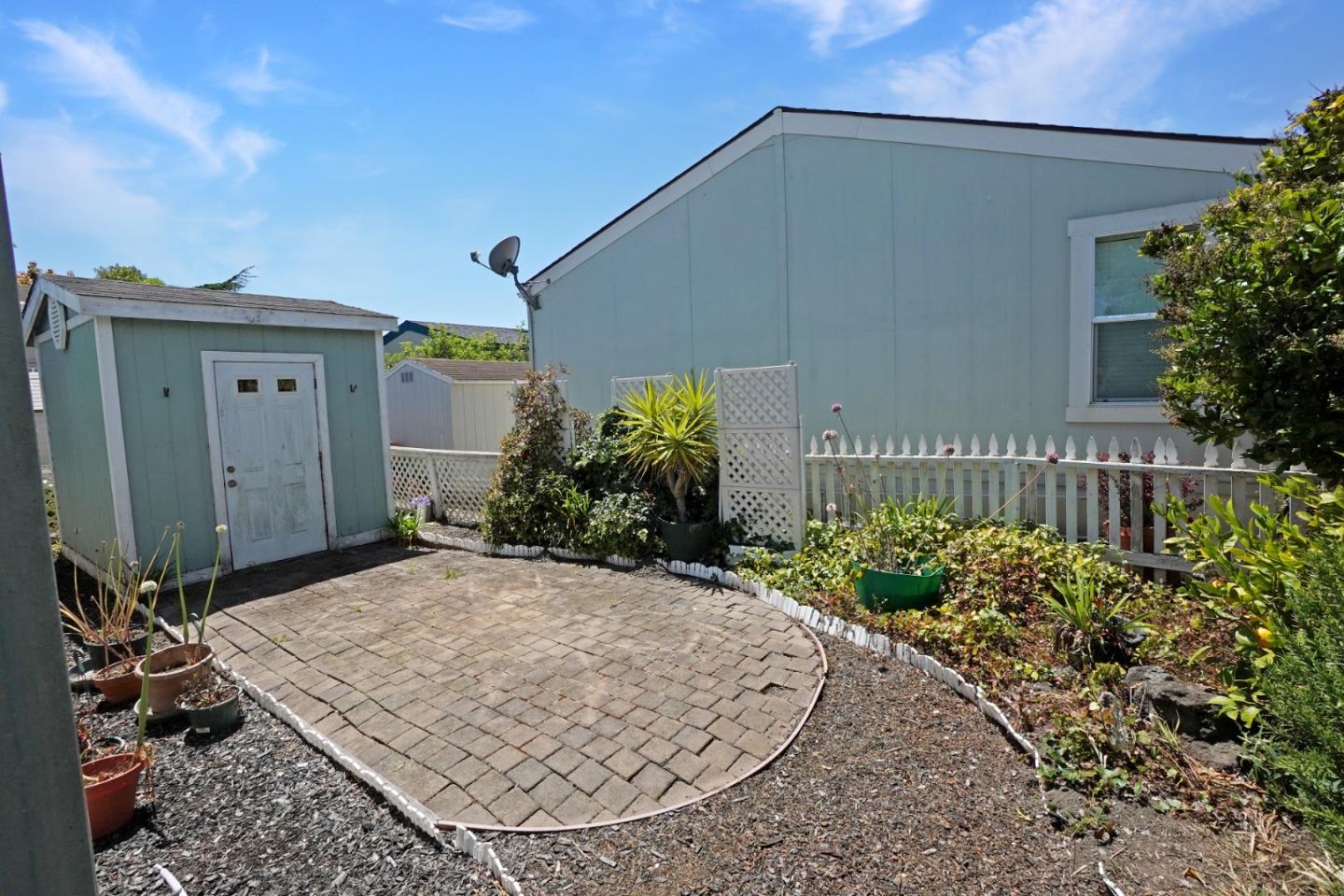 7 Sea Shell Circle, Unit 7 Half Moon Bay, CA 94019 - Photo 3 of 36 a view of a house with a backyard