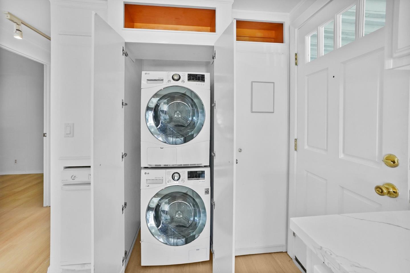 7 Sea Shell Circle, Unit 7 Half Moon Bay, CA 94019 - Photo 7 of 36 a utility room with dryer and washer