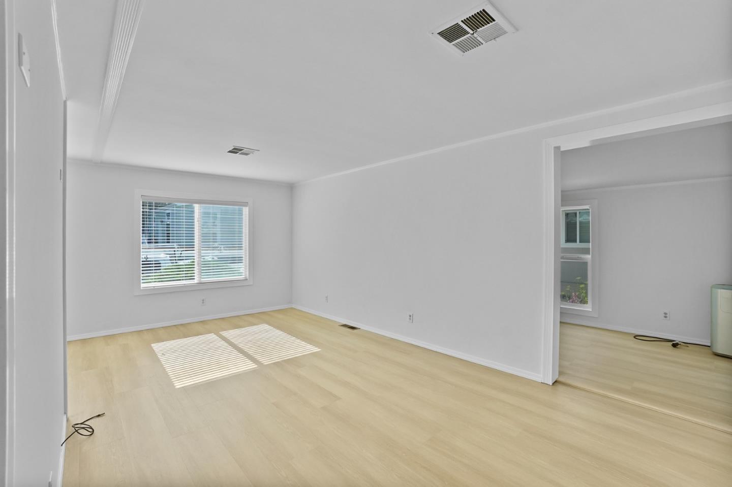 7 Sea Shell Circle, Unit 7 Half Moon Bay, CA 94019 - Photo 8 of 36 an empty room with windows