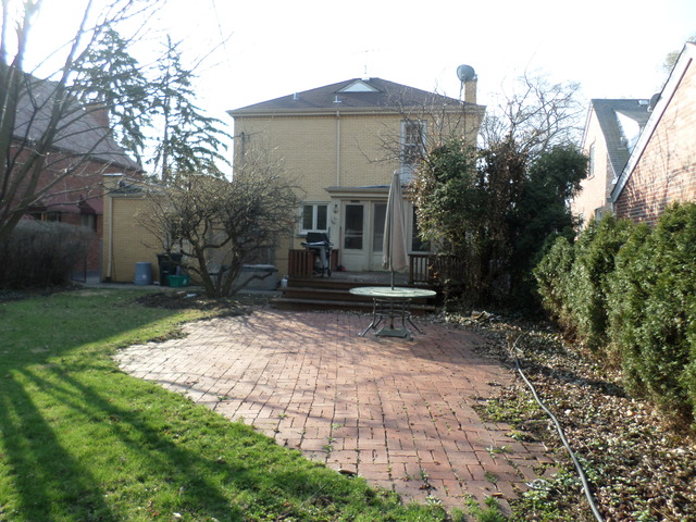 444 Loudon Road Riverside, IL 60546 - Photo 15 of 23 a view of a house with backyard and garden