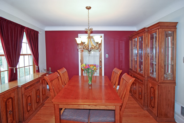 444 Loudon Road Riverside, IL 60546 - Photo 4 of 23 a view of a dining room with furniture window and wooden floor