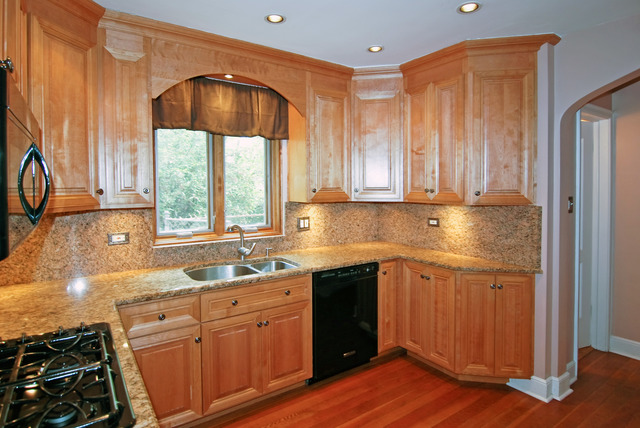 444 Loudon Road Riverside, IL 60546 - Photo 6 of 23 a kitchen with stainless steel appliances a sink cabinets and wooden floor