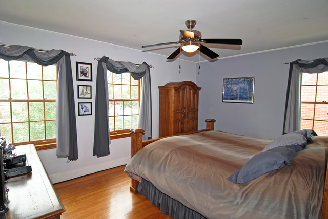 444 Loudon Road Riverside, IL 60546 - Photo 7 of 23 a bedroom with a large bed and a window