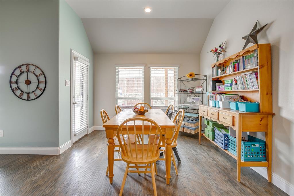 15141 Fleet Hill Road Aledo, TX 76008 - Photo 11 of 37 a view of a dining room with furniture window and wooden floor
