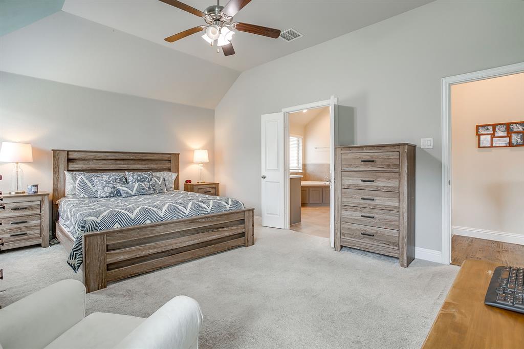 15141 Fleet Hill Road Aledo, TX 76008 - Photo 13 of 37 a bedroom with a bed and a television