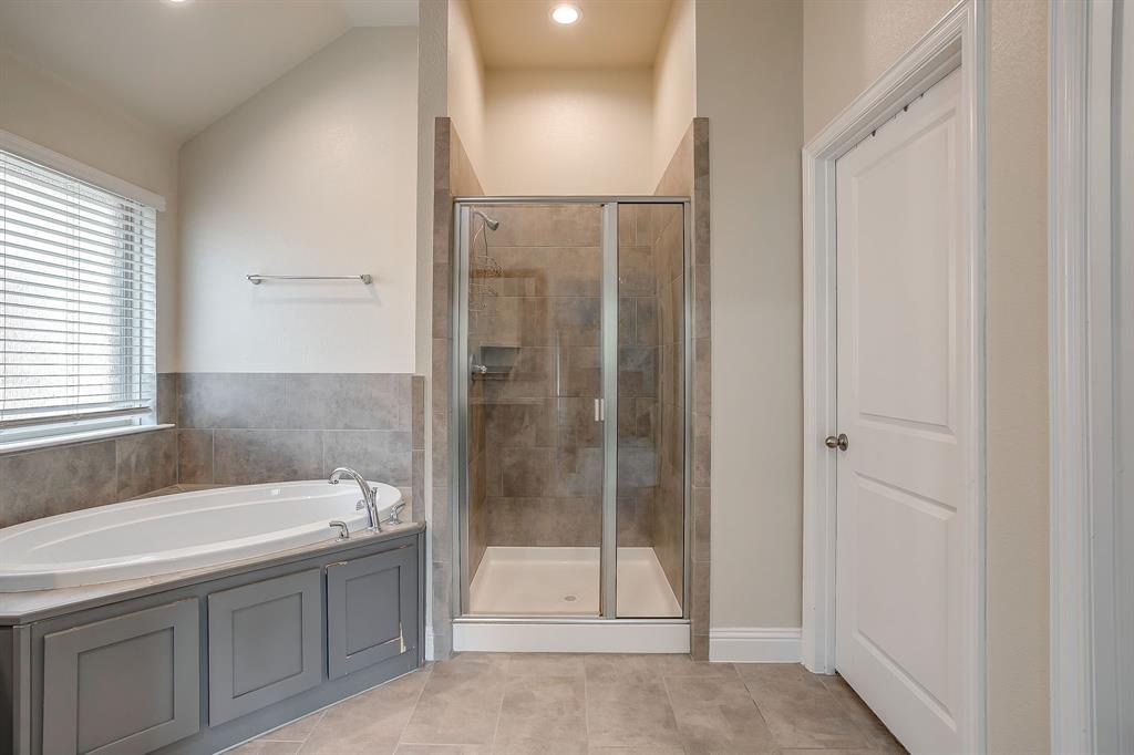 15141 Fleet Hill Road Aledo, TX 76008 - Photo 15 of 37 a bathroom with a sink and a shower