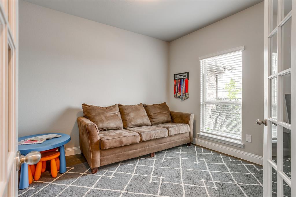 15141 Fleet Hill Road Aledo, TX 76008 - Photo 16 of 37 a living room with furniture and a window