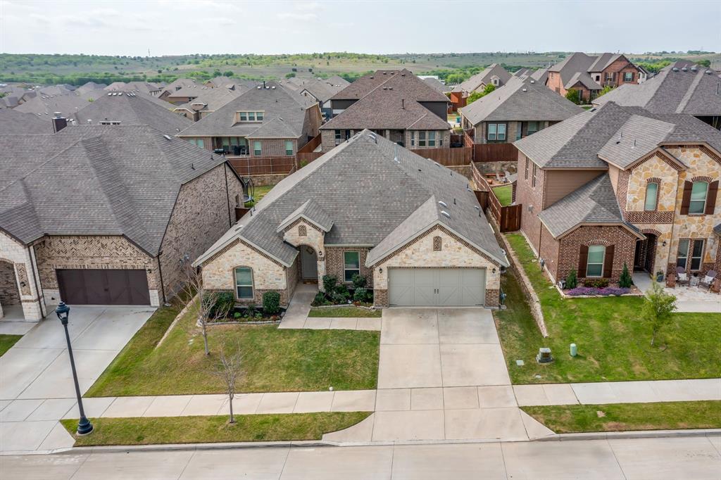 15141 Fleet Hill Road Aledo, TX 76008 - Photo 32 of 37 an aerial view of a house with a yard