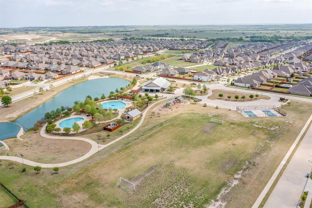 15141 Fleet Hill Road Aledo, TX 76008 - Photo 33 of 37 a view of a swimming pool with an ocean view