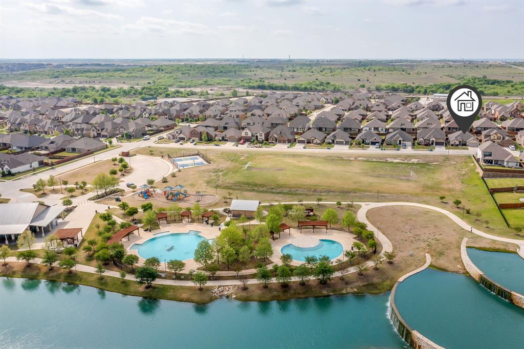 15141 Fleet Hill Road Aledo, TX 76008 - Photo 36 of 37 an aerial view of a house with a lake view