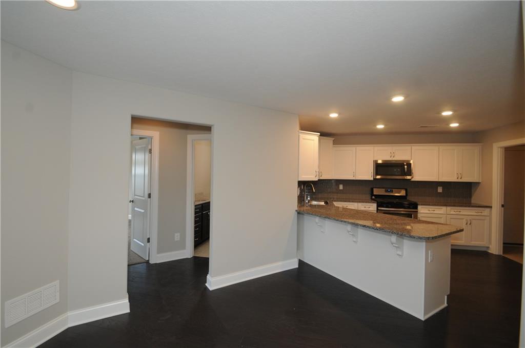 368 Saddlebrook Road, Unit LOT 22B) Gibsonia, PA 15044 - Photo 9 of 25 Kitchen, dinning and view to 2nd and 3rd bedroom