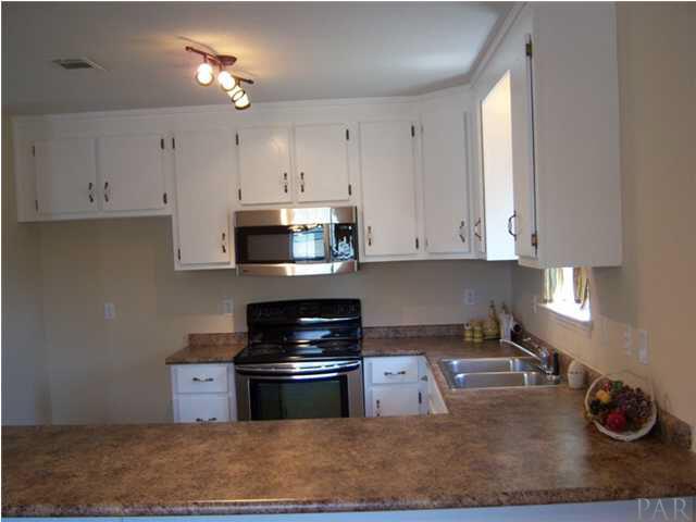 View of kitchen from dining area