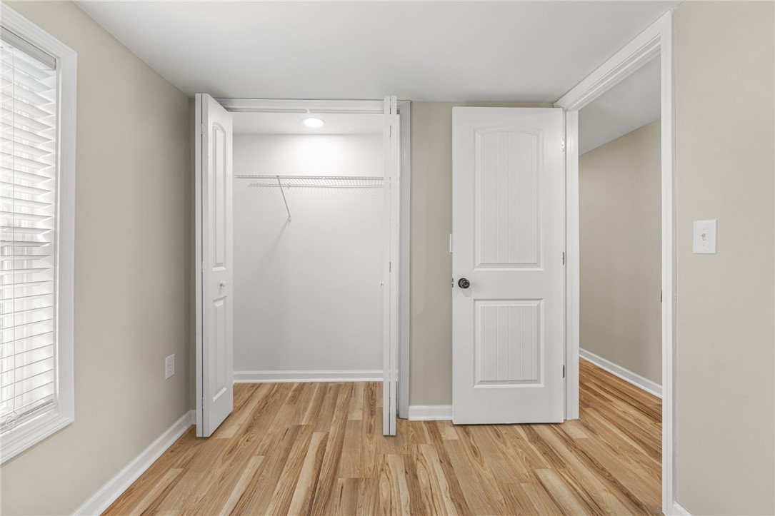 139 Davis Road Easley, SC 29640 - Photo 16 of 34 This bright room features durable flooring and convenient closet storage for modern living.