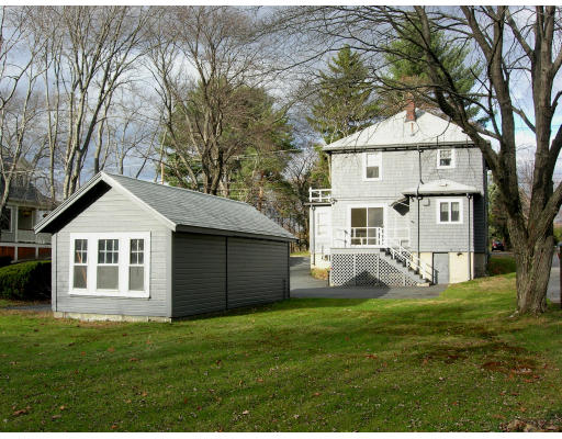 22 Middle Street Lexington, MA 02421 - Photo 5 of 5 a front view of a house with a yard and trees