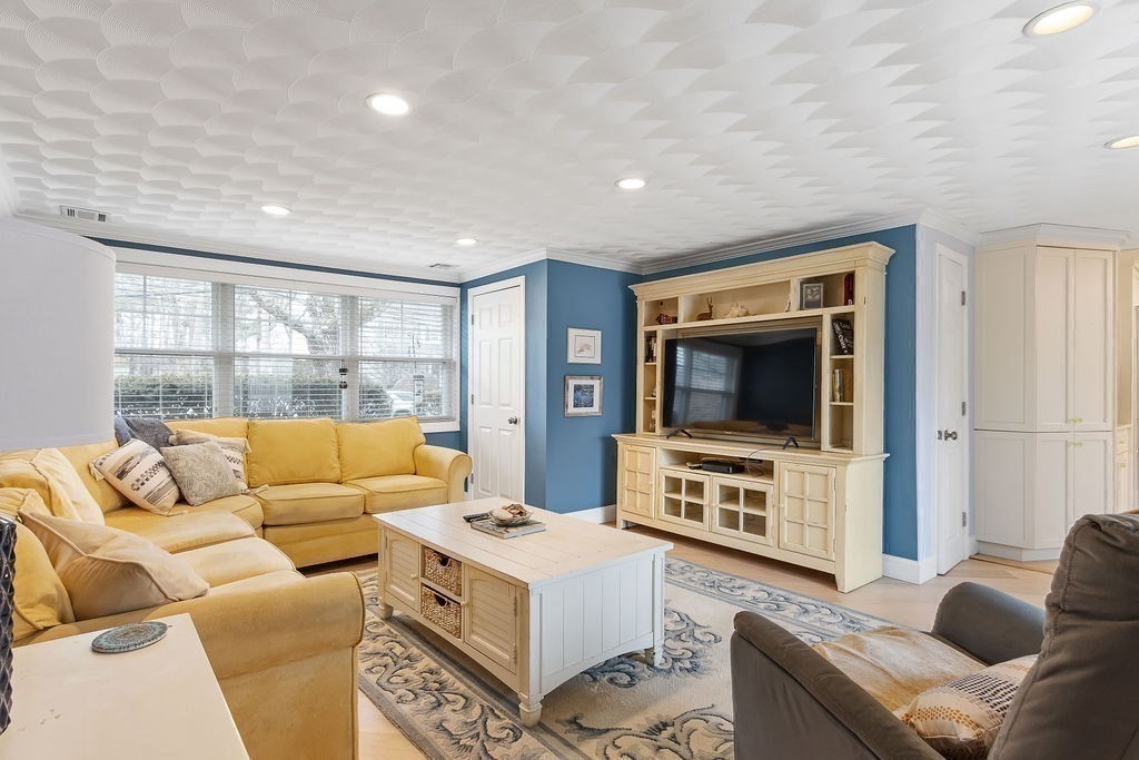 3 Oxbow Road Natick, MA 01760 - Photo 22 of 29 a living room with furniture tv and a flat screen tv