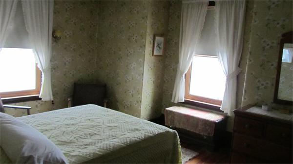 16 Huntington Road Milton, MA 02186 - Photo 12 of 24 a bedroom with a bed and a window