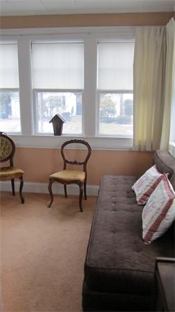 16 Huntington Road Milton, MA 02186 - Photo 19 of 24 a bedroom with furniture and a window