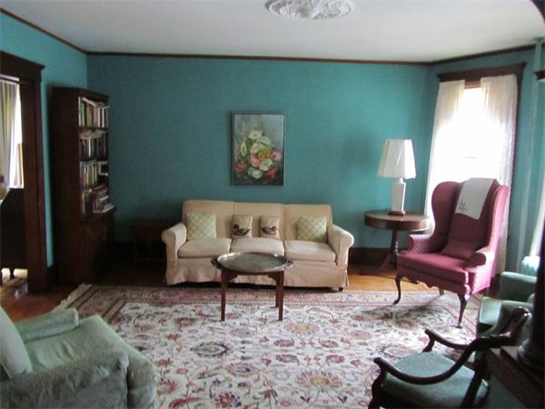 16 Huntington Road Milton, MA 02186 - Photo 6 of 24 a living room with furniture and a large window