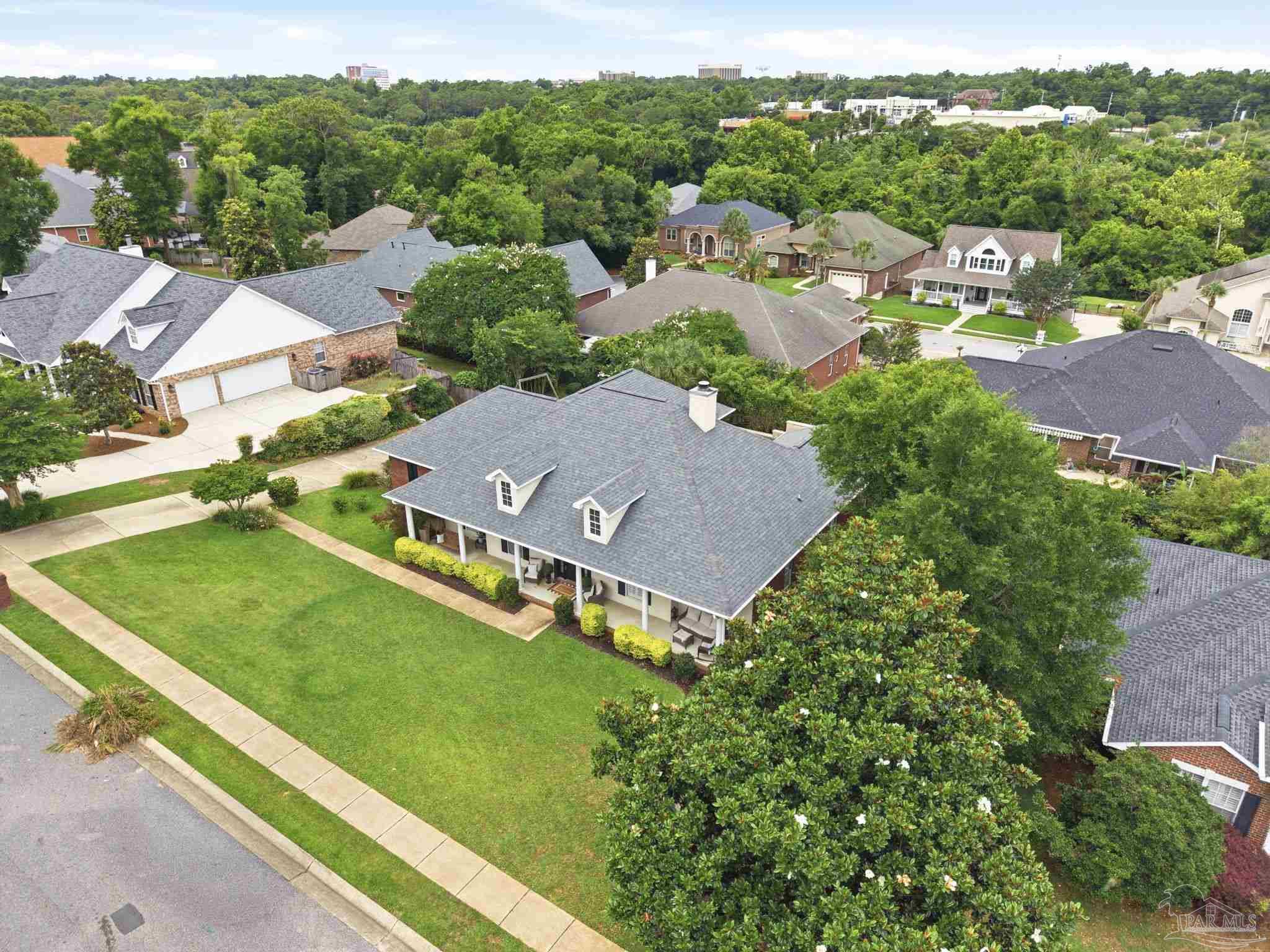 5931 Otter Point Road Pensacola, FL 32504 - Photo 65 of 67 an aerial view of residential houses with outdoor space and street view
