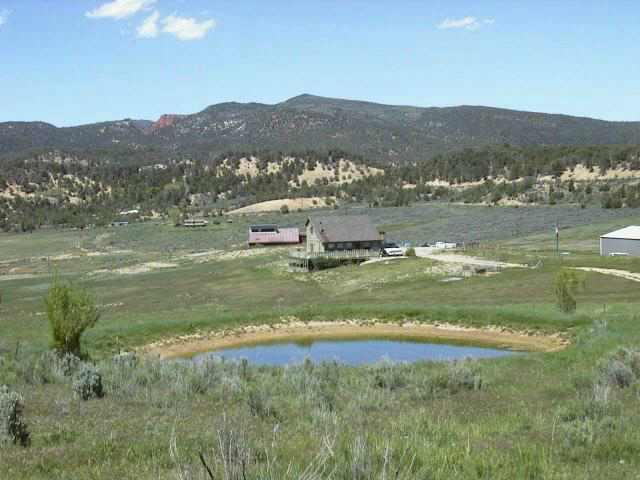 3194 226th Road Silt, CO 81652 - Photo 6 of 6 a view of a town with mountains in the background